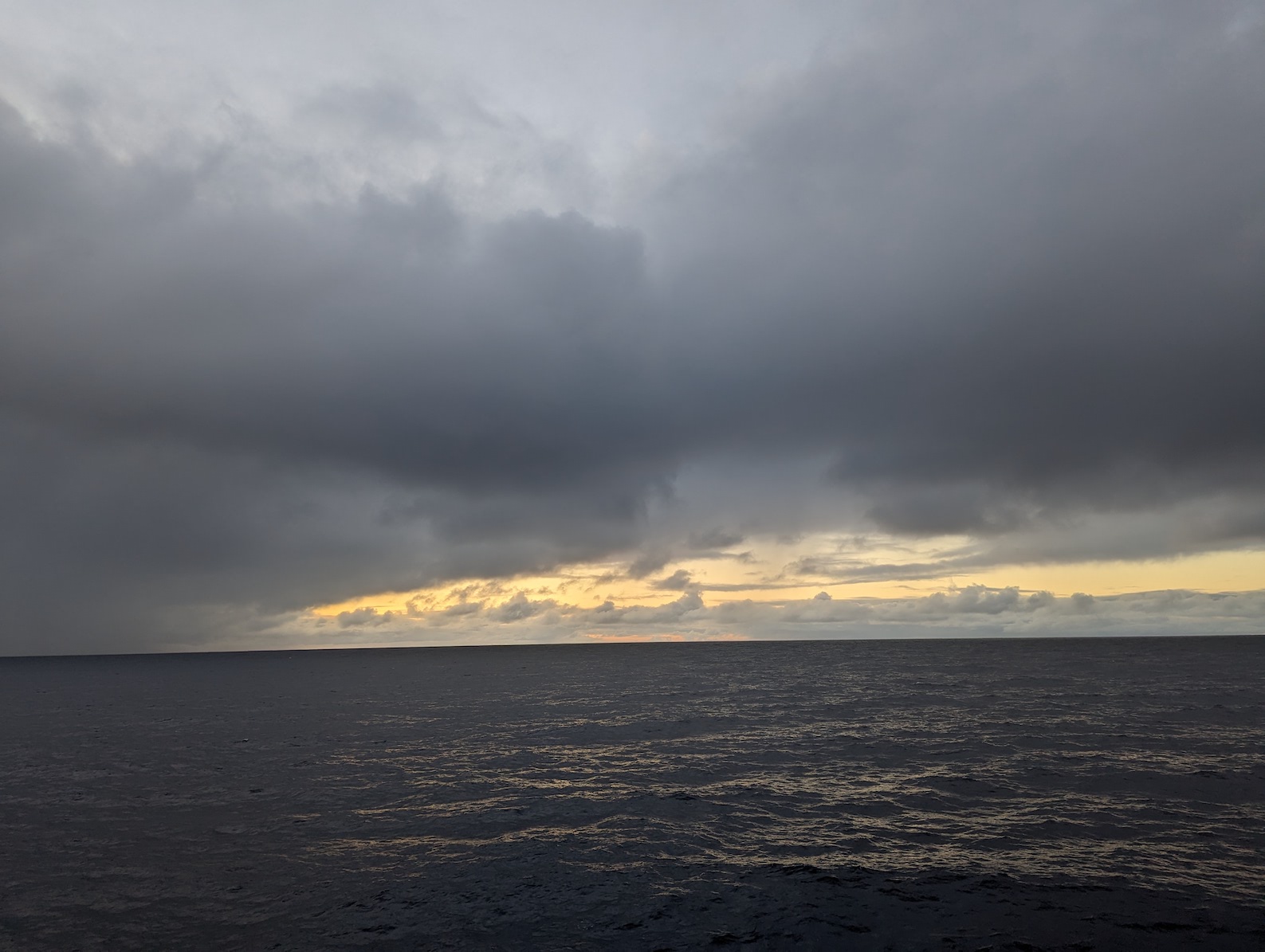 moody sky at sunset with lots of dark clouds